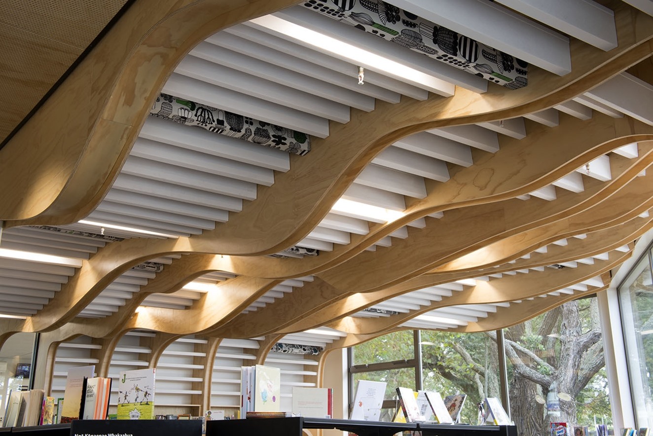Devonport Library showing rows of white Baffle Beams installed to undulating ceiling