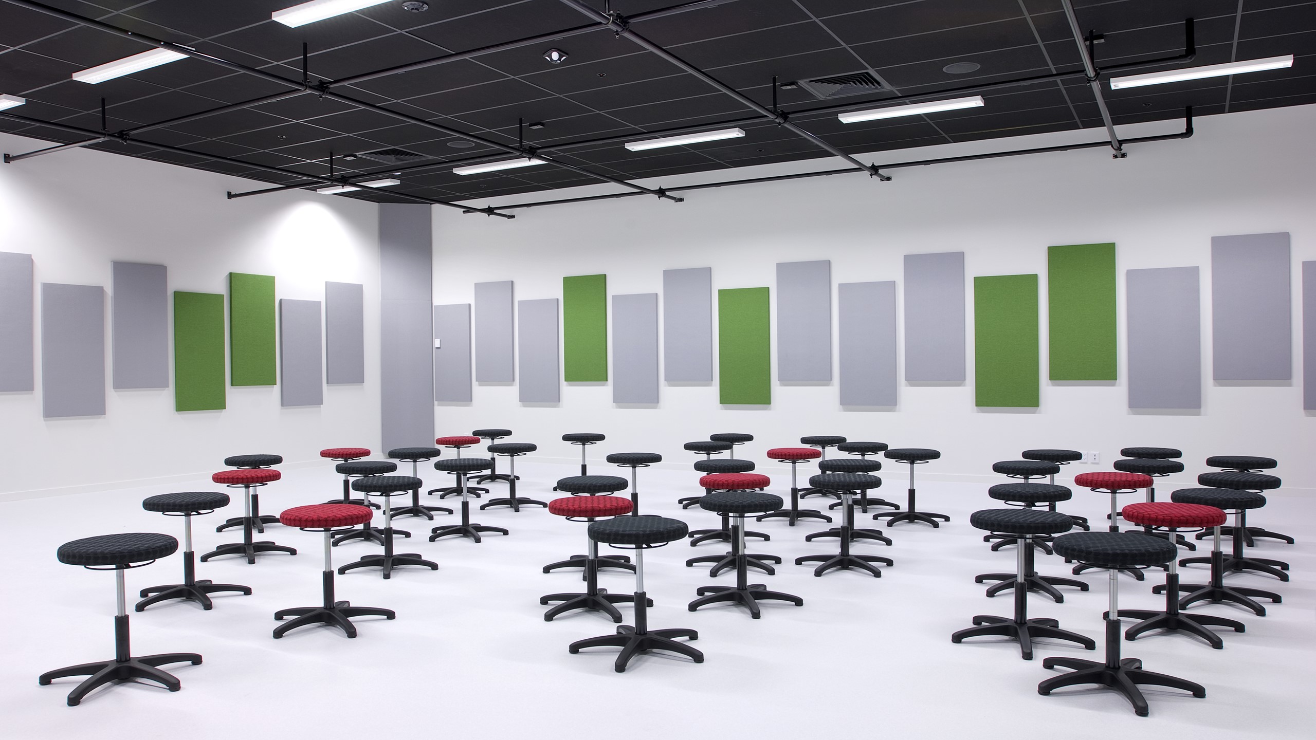 Hobsonville Point Intermediate Music Room showing direct fixed rectangular Fabwall panels wrapped in grey and green fabrics